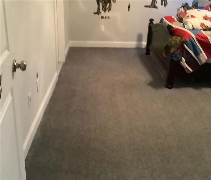 bedroom after carpet cleaned and reinstalled