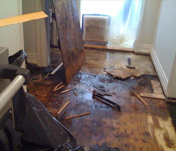 home destroyed by flooding caused by storms